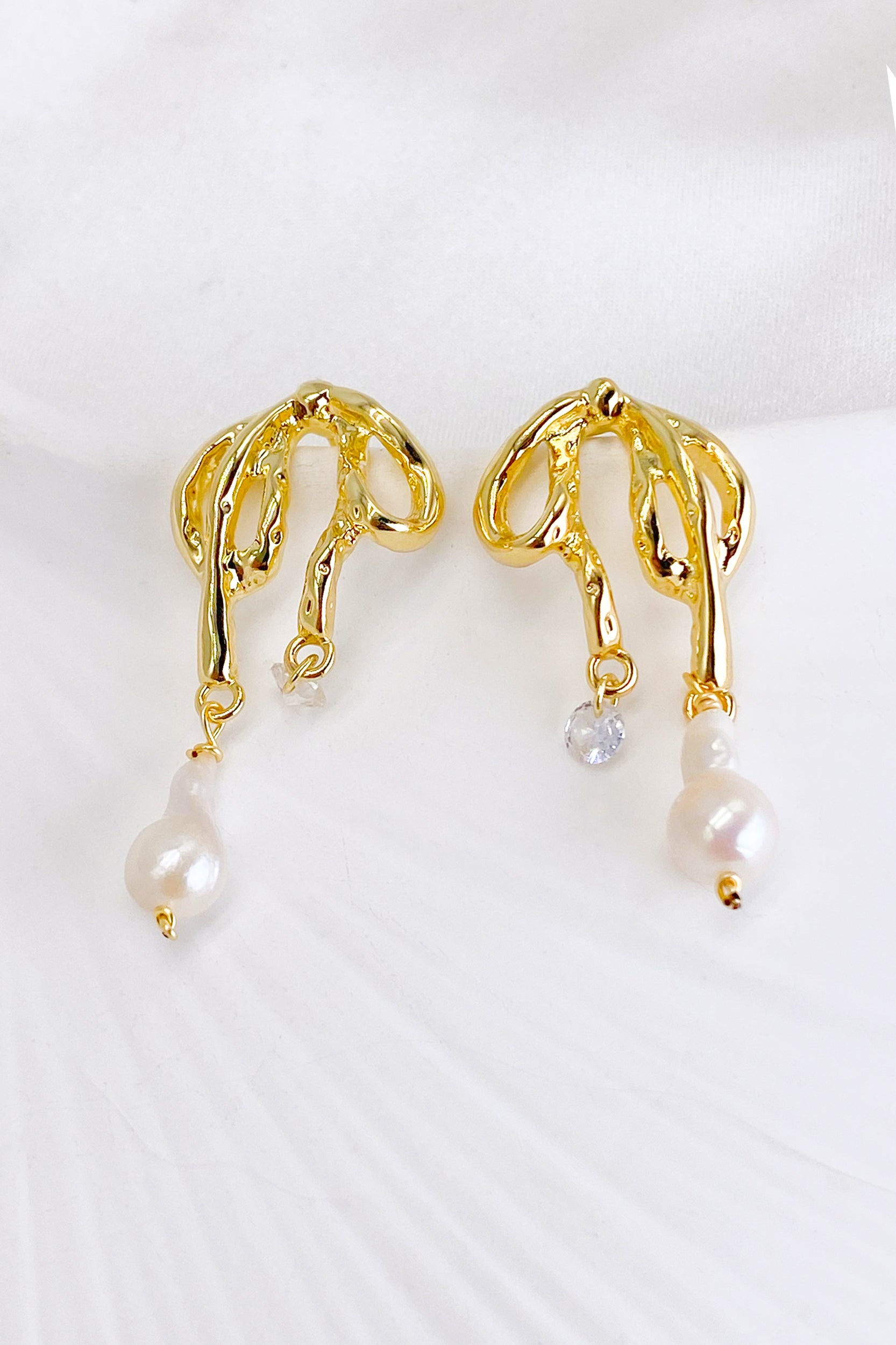 LOFT Pearlized Bow Statement Earrings | The Summit